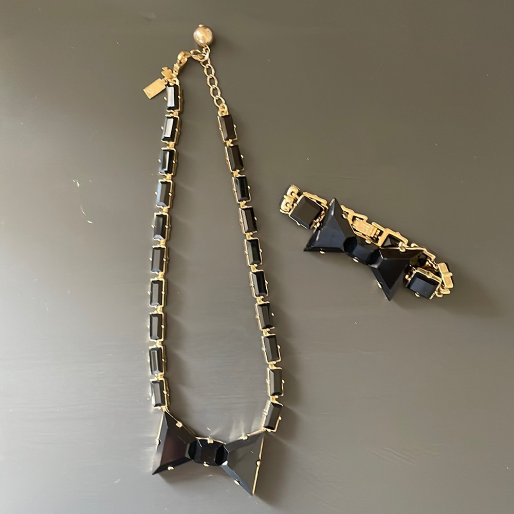Kate Spade statement pieces:  black bowtie necklace and bracelet!
